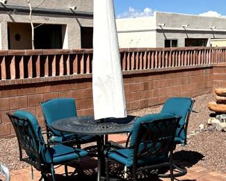 Hanamint 48" Round Mayfair Dining Table. 2-swivel chairs, 2-dining chairs w/Sunbrella cushions. 9ft. Glide Tilt Market Umbrella w/base & cover. Retail $3500+