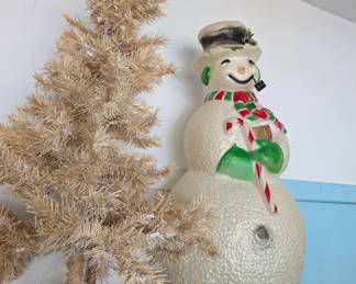 snowman blowmold has damage at tophat