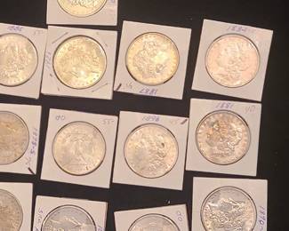 A few of the 100+ Silver Dollars in this sale 
