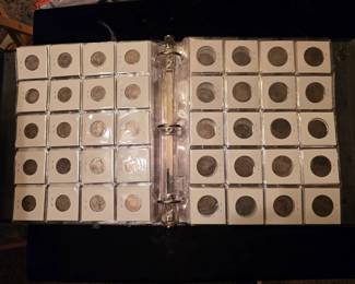 A few of the hundreds of coins in various denominations in this sale 