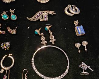 A few of the hundreds of pieces of Sterling jewelry in this sale. 