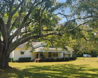 Home on acre plus lot also for sale.