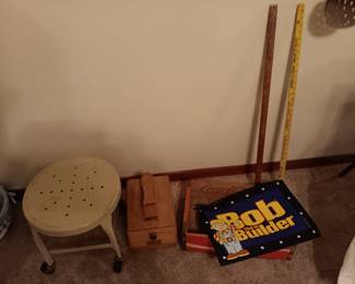 vintage metal rolling shop stool, shoe shine kit, coke crate and Bob The Builder placemat