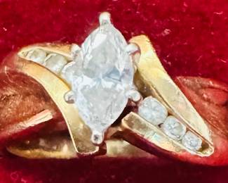 Marquise Diamond Ring
With diamond chips set in 14 karat gold