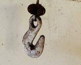 Lots of hooks, weights, and other rusty metal items