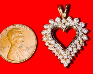 1.2 carat diamond heart pendant 14 karat gold