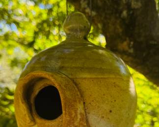 Handmade pottery birdhouse
