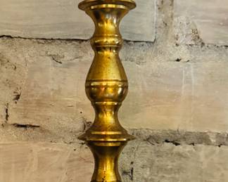 Several brass candlesticks
