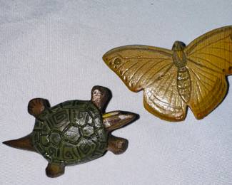 Hand carved pins made by Leslie Rogers