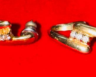 Diamond earrings set in 14 karat gold diamond chips 1/32 each/6 chips