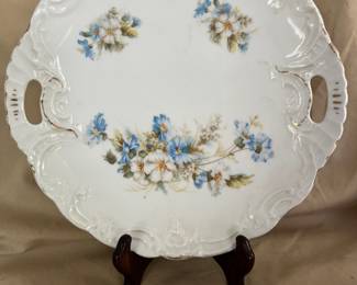 A Limoges Floral plate is a 9.5" wide plate crafted in France. Some wear on gold edging