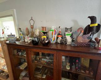 Art vases, planters and carved wooden art.