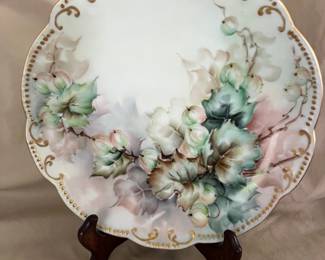 A K Limoges Floral Porcelain Plate measuring 8.5 inches in diameter. Gold bead edging.