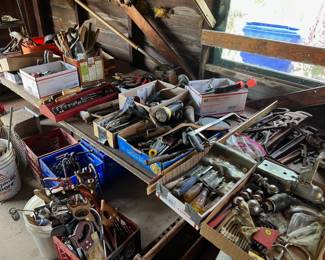 Wide variety of hand tools, saws, hammers, screwdrivers and others.