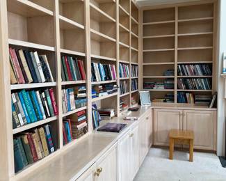 I mentioned earlier the bookshelves in the house. Come see what books are here.