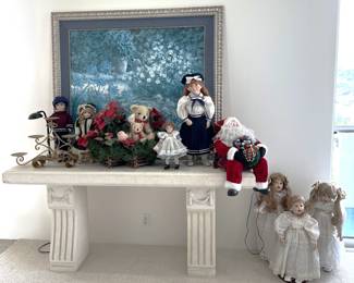 The doll theme continues with this holiday-related collection. I should also point out the large, framed art behind the dolls.