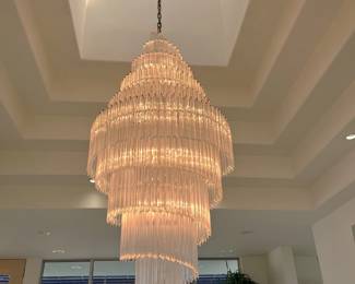 Here is a better look at the chandelier. There are a pair of crystal wall chandeliers and a second chandelier coming up.