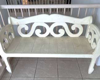 Having a convenient place to sit here and there is important. For instance, this white bench looks like an excellent place.