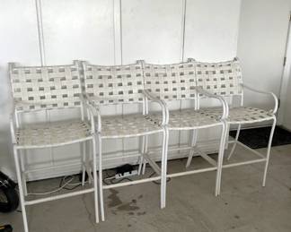 And this photo shows the four patio barstools by Brown Jordan.