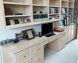 One of the shelving units includes a built-in desk area. Very neat.