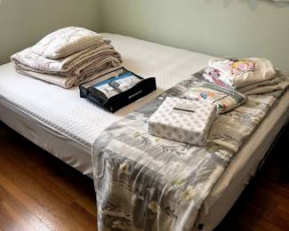 Adjustable bed with mattress