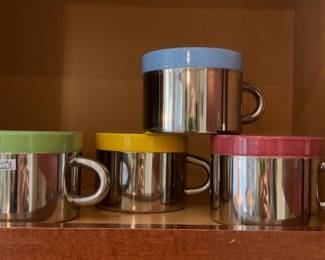 STAINLESS STEEL AND POTTERY MUGS 