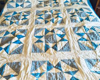 Blue and white star quilt