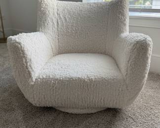 Pottery Barn Teen Lennon Low Swivel Lounger Upholstered in Sherpa Ivory. Measures 28.5" W x 30" D x 27" H. Photo 1 of 3.