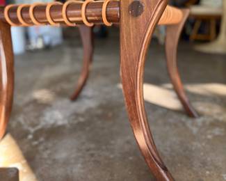 Klismos Walnut Wood Woven Leather Stool with Saber Legs. Measures 25.2ʺ W × 25.2ʺ D × 17.32ʺ H. Photo 3 of 3. 