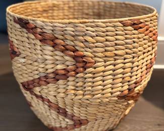 Woven Basket. Measures 17" D x 15" H. 