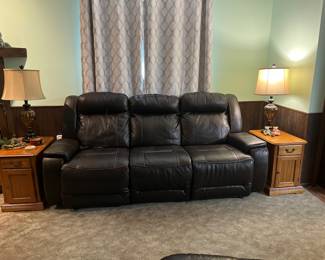 Faux Leather reclining sofa- perfect for watching football games.