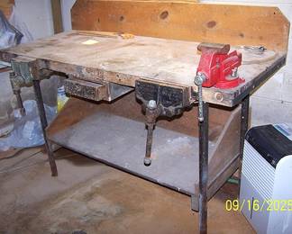 Work bench with Fuller vise in basement