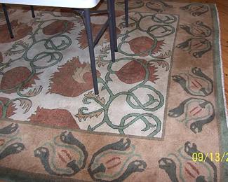 8 ft. by 10 ft. hand knotted wool rug