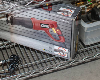 Tools, new and old plus several radios.