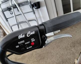 Control panel on handle. 