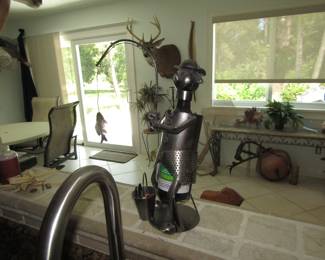 Metal fisherman wine bottle holder