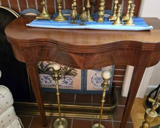Fold top table - Burl wood?  Nice set of brass candle sticks