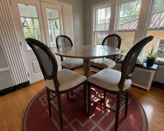 $500 - Hightop breakfast table with 4 barstool-style, full-back and cushioned chairs (Restoration Hardware). Sides of table fold down for smaller areas. Rug available for $50