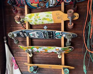 $250 - 5 skateboards and custom skateboard wall mount. 1 Penny board. 2 longboards. 1 trick board and 1 open wheel board. 