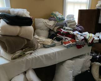 Blankets, pillows, linens galore.