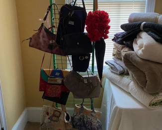 Purses and blankets.  And one really cool umbrella for a sassy lady.
