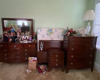 Bedroom Suite includes full headboard and footboard, older mattress set, dresser with mirror, chest and nightstand.