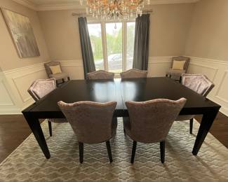 Dining room table with 6 chairs and 2 side chairs.