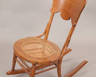Antique caned ladies rocker