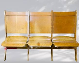 Antique wooden theater seats with flip up seats
