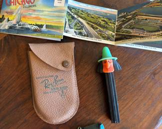 Vintage Ray Ban sunglasses clips, vintage Pez dispenser, vintage post card