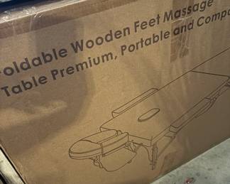 Brand new foldable massage table- still in box