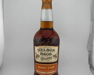 This limited-edition Nelson Bros. Honey Cask Whiskey from Nelson’s Green Brier Distillery marries their award-winning bourbon with a finishing period in honey barrels for a rich, layered profile. Bottled in small batches and rarely available, it offers indulgent notes of honeycomb, vanilla, toasted oak, and warm spice with a smooth, lingering finish. This particular bottle is personally signed by Andy Nelson, adding unique provenance and collectible value to an already sought-after release. Unopened and with the original seal intact, this signed bottle represents an exceptional opportunity for discerning whiskey collectors and enthusiasts alike.