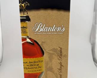 "Blanton’s Original Single Barrel is among the most sought-after bourbons in the world, celebrated as the first commercially released single barrel bourbon. Hand-selected from the legendary Warehouse H at Buffalo Trace Distillery, each barrel is carefully chosen for its exceptional character, making every bottle a one-of-a-kind expression of Kentucky craftsmanship. Encased in its signature horseshoe-shaped bottle topped with a collectible horse-and-jockey stopper, this release embodies both history and artistry. Every stopper is part of a series that spells out B-L-A-N-T-O-N-S, making it especially prized among collectors. This bottle stopper is "B".