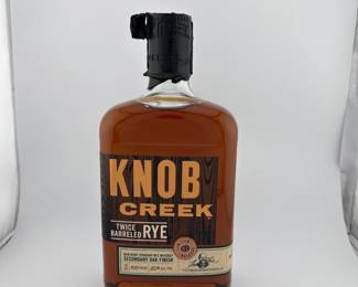 Knob Creek Twice Barreled Rye is a rare and innovative expression from Knob Creek Distillery, showcasing the bold craftsmanship of Kentucky rye whiskey. This small-batch release begins with Knob Creek’s classic rye, which is aged and bottled, then finished in fresh barrels for a secondary maturation that deepens its complexity and flavor profile. Bottled at [insert proof] and non-chill filtered, it delivers a robust, full-bodied experience highly prized by collectors and enthusiasts.
